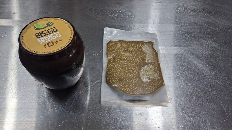 김진국님의 장터 판매 상품 [완도산 전복장1kg(중 사이즈 8미, 소스 등)+ 전복내장죽(300g) 판매합니다.] 첨부 사진